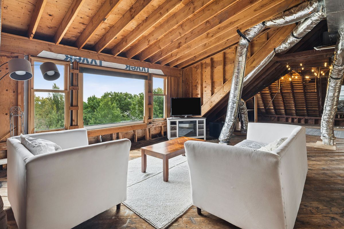 Third floor attic with exposed timber framing at 184 Upper Mountain Avenue