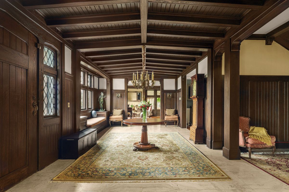 Entrance hall with paneled walls, beamed ceiling and leaded glass at 184 Upper Mountain Avenue