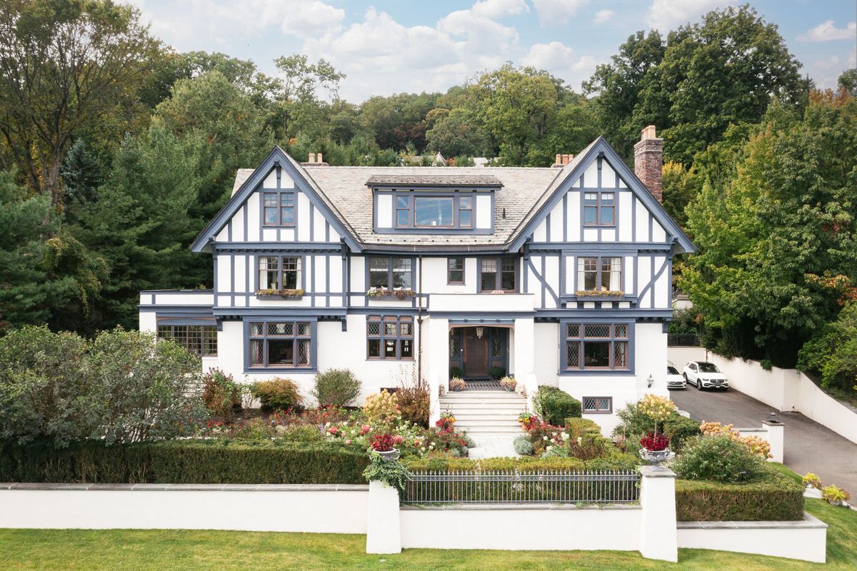 Front elevation of the half timbered Tudor residence above its garden walls, 184 Upper Mountain Avenue