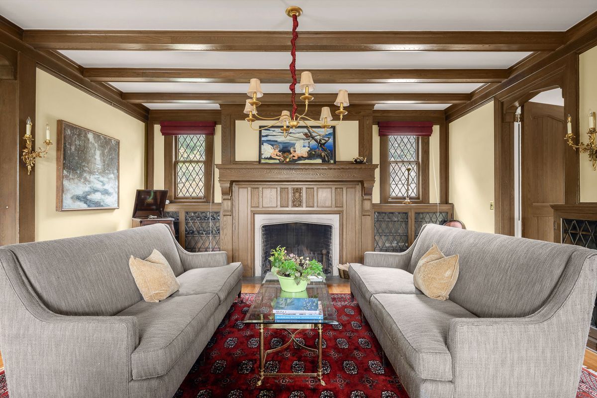 The living room fireplace and carved mantel at 184 Upper Mountain Avenue
