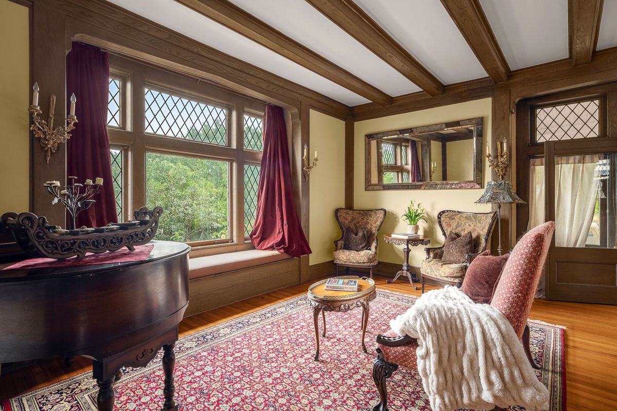 Leaded windows and built in window seating in the living room at 184 Upper Mountain Avenue